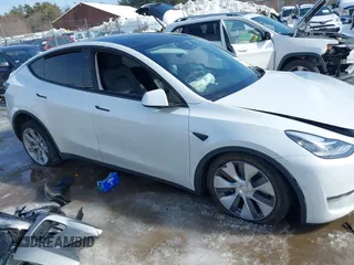 2022 Tesla Model Y Long Range with VIN 7SAYGDEE1NA013066, listed as a IAAI auction lot 41646912 with Not Provided miles and . Bid and sale history available at DreamBid. Image 13.