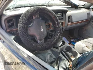 1996 Jeep Grand Cherokee Laredo with VIN 1J4FX58S6TC349590, listed as a Copart auction lot 72278714 with 0 mi miles and Salvage Title. Bid and sale history available at carsss.com. Image 8.