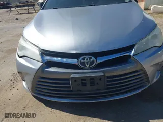 2015 Toyota Camry XLE with VIN 4T4BF1FK9FR499888, listed as a IAAI auction lot 41676657 with 148,310 mi miles. Bid and sale history available at carsss.com. Image 6.