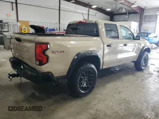 2023 Chevrolet Colorado 4WD Trail Boss with VIN 1GCPTEEK6P1249890, listed as a Copart auction lot 45873595 with 46,702 mi miles and Salvage title. Bid and sale history available at DreamBid. Image 3.