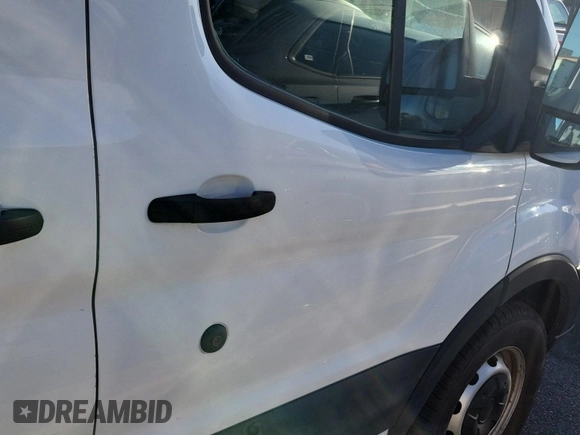 2019 Ford Transit z VIN 1FTYR2CG7KKA96911, wystawiony jako IAAI lot #42566551 z przebiegiem 207 807 mil mil oraz . Historia ofert i sprzedaży dostępna na DreamBid. Obrazek 20.