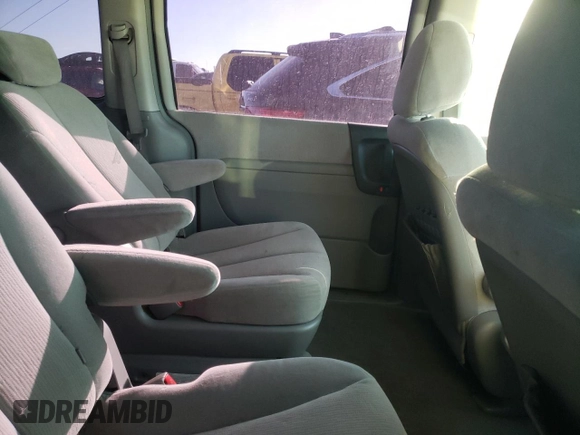 2007 Kia Sedona EX with VIN KNDMB233X76109232, listed as a Copart auction lot 77384063 with 208,774 mi miles and Clean Title. Bid and sale history available at carsss.com. Image 11.