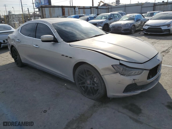 2014 Maserati Ghibli S Q4 with VIN ZAM57RTA8E1095303, listed as a Copart auction lot 82831004 with NaN miles and Salvage Title. Bid and sale history available at carsss.com. Image 4.