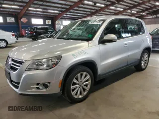 2011 Volkswagen Tiguan SE with VIN WVGBV7AX5BW505591, listed as a Copart auction lot 85017174 with 127,100 mi miles and Salvage title. Bid and sale history available at DreamBid. Image 1.