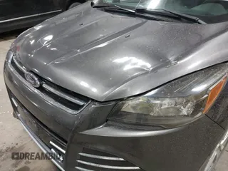 2016 Ford Escape Titanium with VIN 1FMCU9J93GUC39933, listed as a IAAI auction lot 42616323 with 116,482 mi miles and . Bid and sale history available at DreamBid. Image 6.