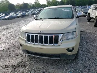 2011 Jeep Grand Cherokee Limited z VIN 1J4RR5GT2BC624923, wystawiony jako Copart lot #55820605 z przebiegiem 217 461 mil mil oraz Czysty tytuł • Clean title. Historia ofert i sprzedaży dostępna na DreamBid. Obrazek 14.