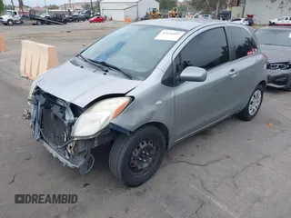 2007 Toyota Yaris with VIN JTDJT923675117537, listed as a IAAI auction lot 42116893 with 210,036 mi miles. Bid and sale history available at carsss.com. Image 2.