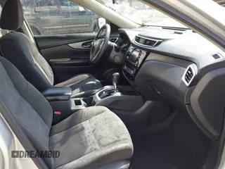 2015 Nissan Rogue S with VIN KNMAT2MT1FP502091, listed as a IAAI auction lot 41940559 with 360,915 mi miles and . Bid and sale history available at DreamBid. Image 5.