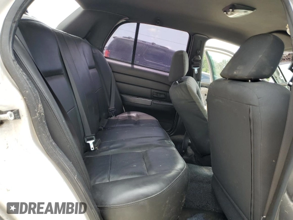 2007 Ford Police Interceptor with VIN 2FAFP71W27X152722, listed as a Copart auction lot 56252475 with 105,657 mi miles and Salvage title. Bid and sale history available at DreamBid. Image 10.