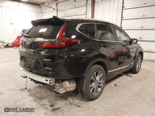 2021 Honda CR-V Touring with VIN 2HKRW2H9XMH653531, listed as a IAAI auction lot 41167970 with 32,228 mi miles. Bid and sale history available at carsss.com. Image 4.