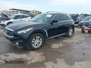 2014 Infiniti QX70 z VIN JN8CS1MU6EM450640, wystawiony jako IAAI lot #42335811 z przebiegiem 143 565 mil mil oraz . Historia ofert i sprzedaży dostępna na DreamBid. Obrazek 2.
