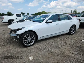 2018 Cadillac CT6 Luxury AWD с VIN 1G6KD5RS7JU105209, выставлен на аукционе Copart как лот 64652055 с пробегом 92 792 миль миль и Списание • Salvage title. История ставок и продаж доступна на DreamBid. Изображение 1.