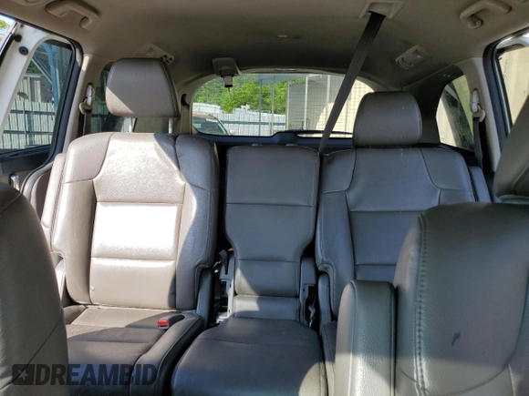 2016 Honda Odyssey Touring Elite with VIN 5FNRL5H97GB129217, listed as a Copart auction lot 52177765 with 138,045 mi miles and Salvage Title. Bid and sale history available at DreamBid. Image 10.