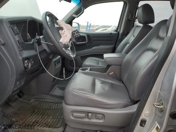 2012 Honda Ridgeline RTS with VIN 5FPYK1F47CB455759, listed as a Copart auction lot 87721645 with 159,319 mi miles and Clean Title. Bid and sale history available at carsss.com. Image 7.