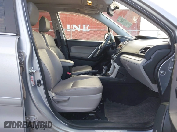 2016 Subaru Forester 2.5i Touring with VIN JF2SJAXC7GH455601, listed as a IAAI auction lot 41876613 with 133,976 mi miles. Bid and sale history available at carsss.com. Image 5.