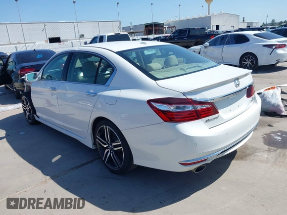 2017 Honda Accord Touring with VIN 1HGCR3F93HA040834, listed as a IAAI auction lot 41979952 with 79,686 mi miles and . Bid and sale history available at DreamBid. Image 3.