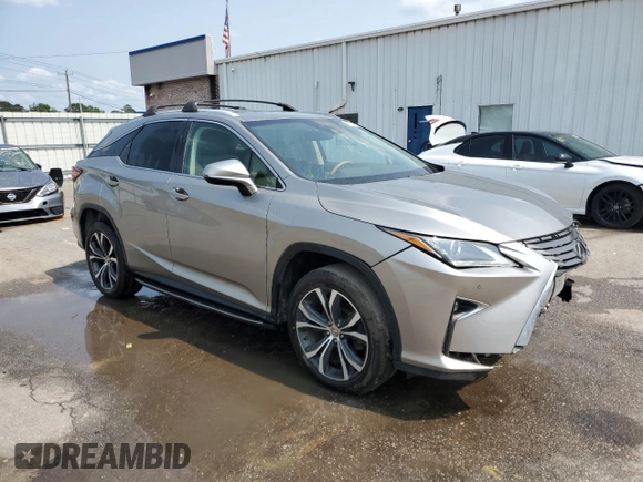 2017 Lexus RX 350 with VIN 2T2ZZMCA2HC052610, listed as a Copart auction lot 58565945 with 137,956 mi miles and Salvage title. Bid and sale history available at DreamBid. Image 4.