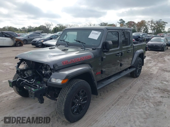 2022 Jeep Gladiator Texas Trail z VIN 1C6HJTAG0NL162804, wystawiony jako IAAI lot #41524087 z przebiegiem 17 652 mil mil oraz . Historia ofert i sprzedaży dostępna na DreamBid. Obrazek 2.