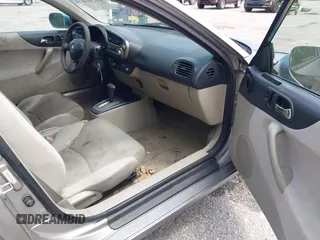 2004 Honda Insight z VIN JHMZE14744T000527, wystawiony jako IAAI lot #42378630 z przebiegiem 1 360 mil mil oraz . Historia ofert i sprzedaży dostępna na DreamBid. Obrazek 5.