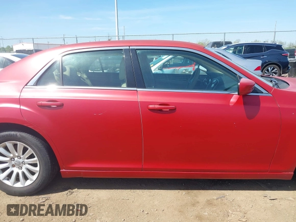 2013 Chrysler 300 with VIN 2C3CCAAG6DH613204, listed as a IAAI auction lot 42094988 with 193,481 mi miles. Bid and sale history available at carsss.com. Image 14.