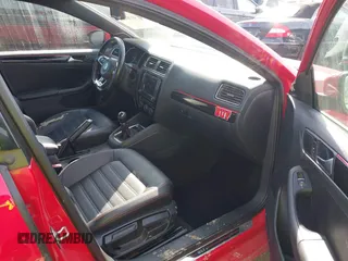 2016 Volkswagen Jetta Sedan 2.0T GLI SE with VIN 3VW5T7AJ0GM357177, listed as a IAAI auction lot 41769034 with 127,324 mi miles. Bid and sale history available at carsss.com. Image 5.