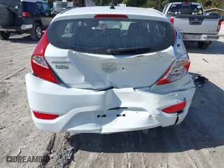 2014 Hyundai Accent GS with VIN KMHCT5AE9EU168274, listed as a IAAI auction lot 40737039 with 40,945 mi miles. Bid and sale history available at carsss.com. Image 6.