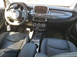2018 FIAT 500X Lounge with VIN ZFBCFXDB5JP664130, listed as a Copart auction lot 73784574 with 67,160 mi miles and Salvage title. Bid and sale history available at DreamBid. Image 8.