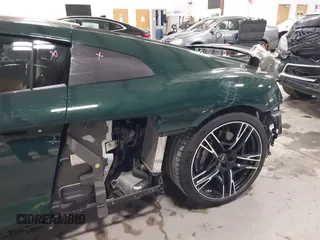 2021 Audi R8 z VIN WUAKBAFX3M7900923, wystawiony jako IAAI lot #41248773 z przebiegiem 7 048 mil mil oraz . Historia ofert i sprzedaży dostępna na DreamBid. Obrazek 19.