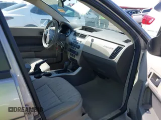 2008 Ford Focus SE with VIN 1FAHP35N68W154490, listed as a IAAI auction lot 42128643 with 141,316 mi miles. Bid and sale history available at carsss.com. Image 5.