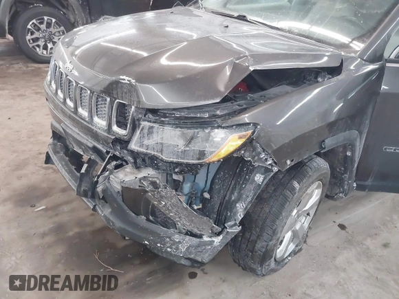 2019 Jeep Compass Altitude with VIN 3C4NJDBBXKT665843, listed as a IAAI auction lot 41561291 with 82,912 mi miles and . Bid and sale history available at DreamBid. Image 6.