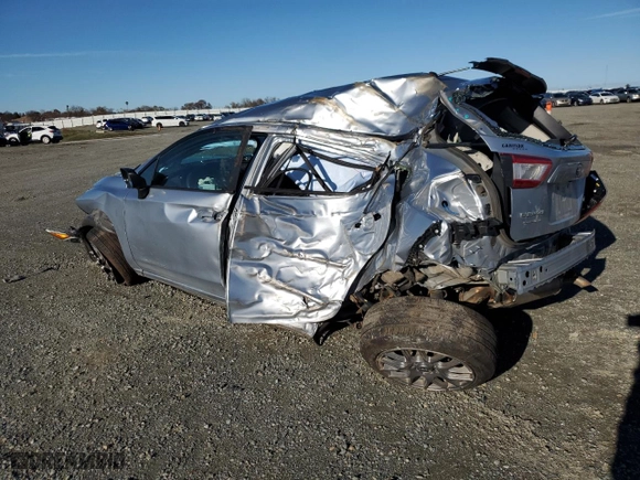 2018 Subaru Impreza with VIN 4S3GTAA65J1733770, listed as a Copart auction lot 86773214 with 57,581 mi miles and Salvage Title. Bid and sale history available at carsss.com. Image 2.