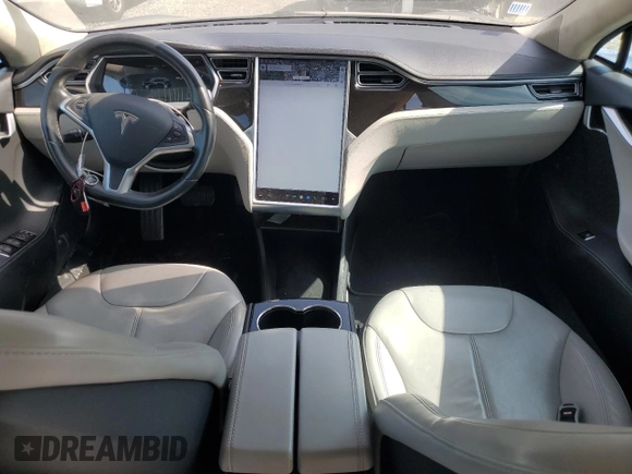 2014 Tesla Model S 60 z VIN 5YJSA1H17EFP33261, wystawiony jako Copart lot #58804465 z przebiegiem 147 583 mil mil oraz Czysty tytuł • Clean title. Historia ofert i sprzedaży dostępna na DreamBid. Obrazek 10.