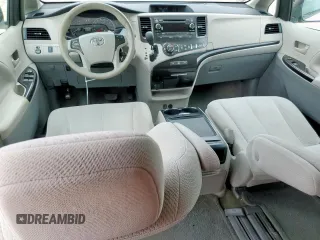 2014 Toyota Sienna LE AAS with VIN 5TDKK3DC1ES424249, listed as a Copart auction lot 62114525 with 193,301 mi miles and Salvage title. Bid and sale history available at DreamBid. Image 8.