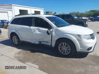 2017 Dodge Journey SXT z VIN 3C4PDCBG9HT510635, wystawiony jako IAAI lot #41590439 z przebiegiem 131 054 mil mil oraz . Historia ofert i sprzedaży dostępna na DreamBid. Obrazek 13.