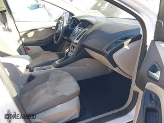 2014 Ford Focus SE with VIN 1FADP3F27EL215930, listed as a IAAI auction lot 41282263 with 130,324 mi miles. Bid and sale history available at carsss.com. Image 5.