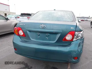 2009 Toyota Corolla with VIN 1NXBU40E39Z047881, listed as a IAAI auction lot 42078719 with 204,258 mi miles. Bid and sale history available at carsss.com. Image 16.