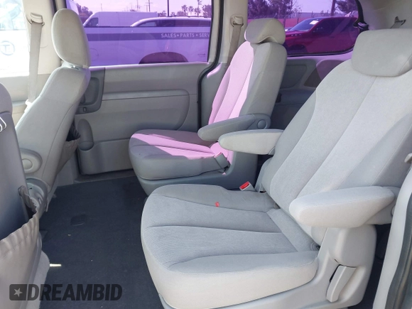 2009 Kia Sedona LX with VIN KNDMB233396300879, listed as a IAAI auction lot 41753122 with 183,754 mi miles. Bid and sale history available at carsss.com. Image 8.