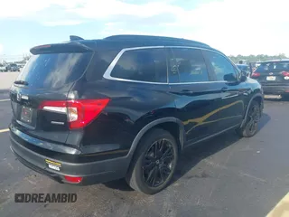 2022 Honda Pilot Special Edition with VIN 5FNYF5H25NB026414, listed as a IAAI auction lot 42590493 with 26,600 mi miles and . Bid and sale history available at DreamBid. Image 4.
