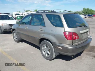 1999 Lexus RX 300 with VIN JT6HF10U9X0080216, listed as a IAAI auction lot 42219637 with 248,595 mi miles and . Bid and sale history available at DreamBid. Image 3.