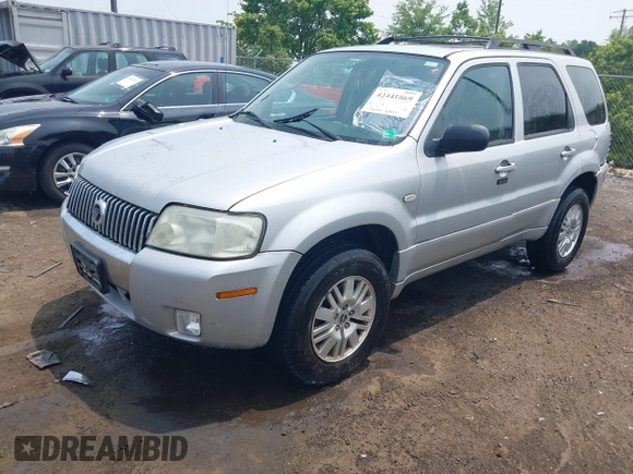 2005 Mercury Mariner Luxury z VIN 4M2CU57135DJ23718, wystawiony jako IAAI lot #42441869 z przebiegiem 179 378 mil mil oraz . Historia ofert i sprzedaży dostępna na DreamBid. Obrazek 2.