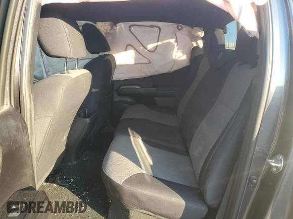 2020 Toyota Tacoma SR5 z VIN 3TMCZ5AN2LM309531, wystawiony jako Copart lot #46415625 z przebiegiem 124 426 mil mil oraz Szkoda całkowita • Salvage title. Historia ofert i sprzedaży dostępna na DreamBid. Obrazek 10.