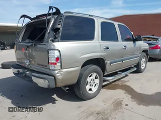 2003 Chevrolet Tahoe LS with VIN 1GNEC13V23R141539, listed as a IAAI auction lot 41812195 with 486,815 mi miles. Bid and sale history available at carsss.com. Image 4.