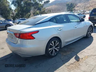2017 Nissan Maxima Platinum with VIN 1N4AA6AP2HC414204, listed as a IAAI auction lot 42394624 with 80,486 mi miles and . Bid and sale history available at DreamBid. Image 4.