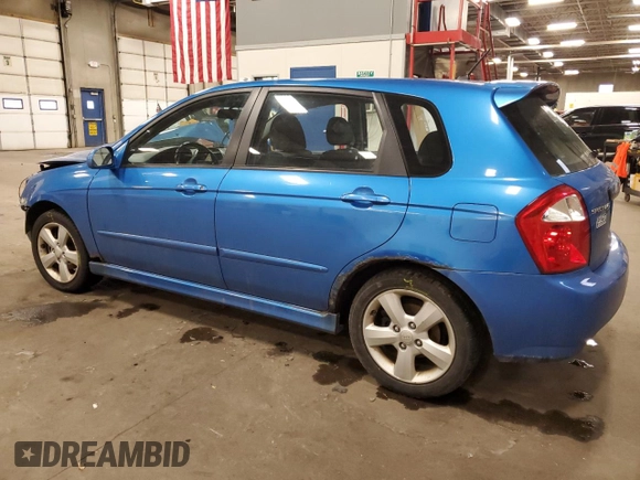2007 Kia Spectra with VIN KNAFE161775007569, listed as a Copart auction lot 86778784 with 125,463 mi miles and Salvage Title. Bid and sale history available at carsss.com. Image 2.