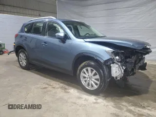 2016 Mazda CX-5 Sport z VIN JM3KE4BY0G0768549, wystawiony jako Copart lot #49923445 z przebiegiem 130 236 mil mil oraz Szkoda całkowita • Salvage title. Historia ofert i sprzedaży dostępna na DreamBid. Obrazek 4.