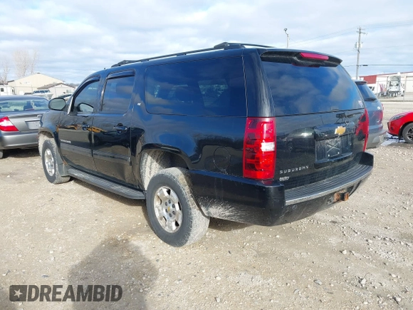 2014 Chevrolet Suburban LT with VIN 1GNSKJE71ER232700, listed as a IAAI auction lot 40812602 with 245,852 mi miles and . Bid and sale history available at DreamBid. Image 3.
