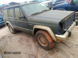 1993 Jeep Cherokee Country z VIN 1J4FJ78S0PL519025, wystawiony jako IAAI lot #42409707 z przebiegiem 162 231 mil mil oraz . Historia ofert i sprzedaży dostępna na DreamBid. Obrazek 1.