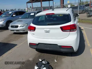 2023 Kia Rio S with VIN 3KPA25AD0PE629868, listed as a IAAI auction lot 41738952 with 25,642 mi miles and . Bid and sale history available at DreamBid. Image 17.