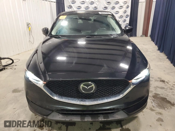 2018 Mazda CX-5 Touring with VIN JM3KFACM7J1452929, listed as a Copart auction lot 51945625 with 93,133 mi miles and Clean Title. Bid and sale history available at carsss.com. Image 5.