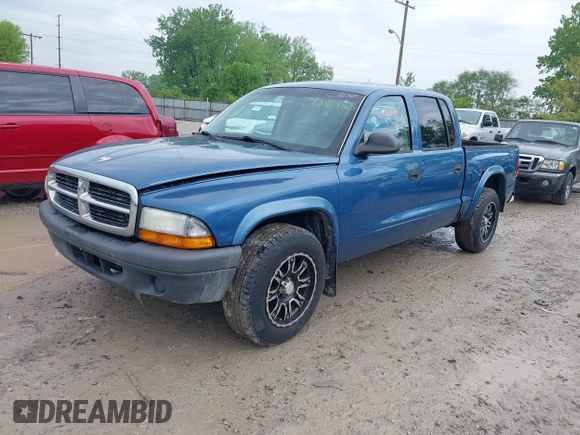 2001 Dodge Dakota Sport with VIN 1B7HG2AN21S194735, listed as a IAAI auction lot 42182165 with 163,350 mi miles and . Bid and sale history available at carsss.com. Image 2.